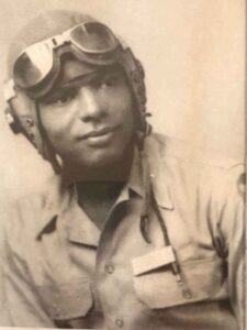 Tuskegee Airmen Sgt William Thomas Hunt wearing a fabric cap and flight goggles.