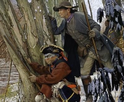 Two male hunters in a winter woods.