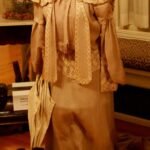 alt="woman's outfit with boots"