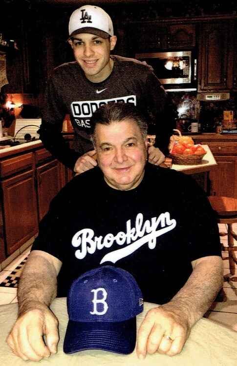 Lou Palumbo and son wearing vintage Brooklyn Dodgers shirts.