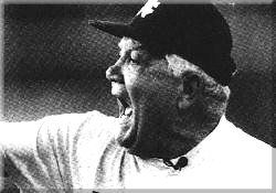 Photo of Lindy Lauro wearing cap and yelling.